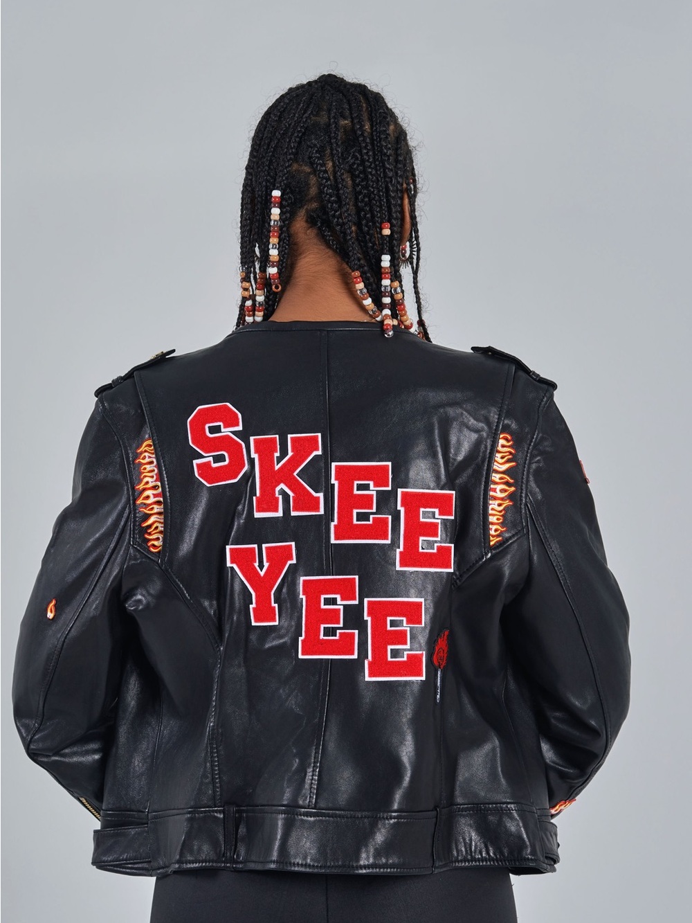 Wilsons Leather Black Faux Leather Jacket with Red Lettering